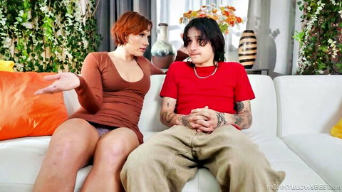 Kell Fire in tight dress seduces young guy on couch