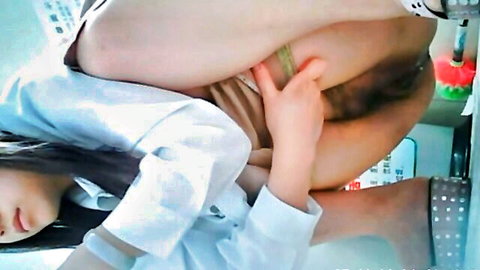 Asian college girl in white shirt touched intimately in voyeur bathroom
