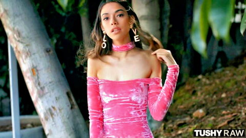 Hot brunette in tight pink velvet off-shoulder dress teases curves outdoors for Tushy Raw anal site