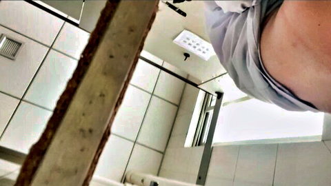 Voyeur hidden cam catches East Asian amateur's ass in white panties in bathroom shower