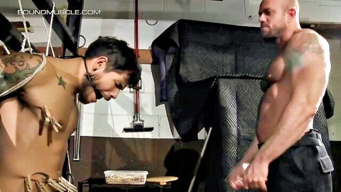 Matt Stevens bound and tormented by muscular officer in BDSM scene