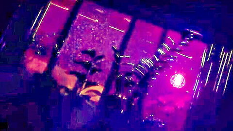 Mysterious dark ritual scene with purple lighting and shadowy figures