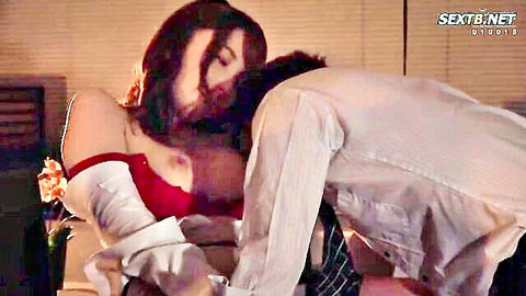 Busty brunette in red bra gets huge tits worshipped by kneeling man kissing cleavage