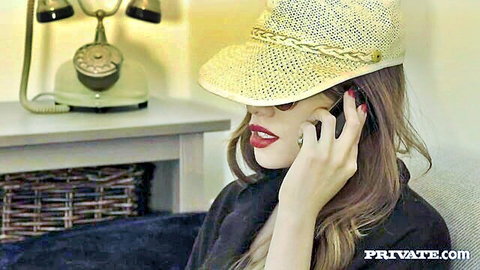 Seductive MILF Dani Daniels in straw hat talking on phone