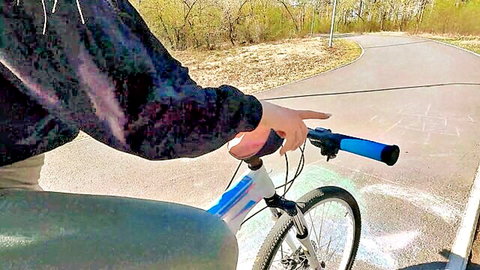 Woman biking on forest path in casual clothes, leading to rough outdoor sex