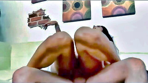 Skinny Indian babe spreads legs wide on couch pulling white panties aside exposing shaved pussy closeup