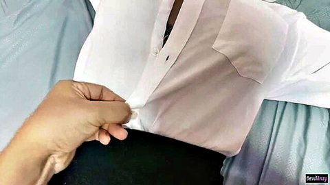 Asian office girl unbuttoning white blouse in teasing bedroom scene