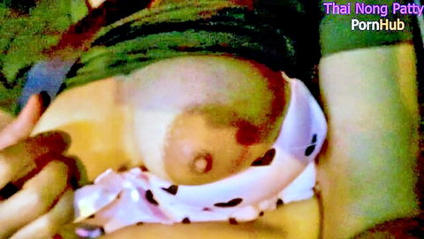 Thai military wife exposing big tits in car during blowjob encounter