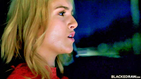 Mazzy Grace blonde in red dress, seductive profile view