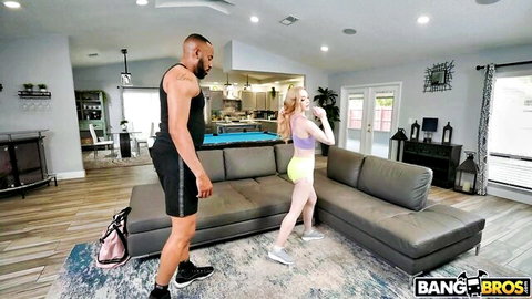 Emma Starletto in yellow workout shorts teasing muscular black stud