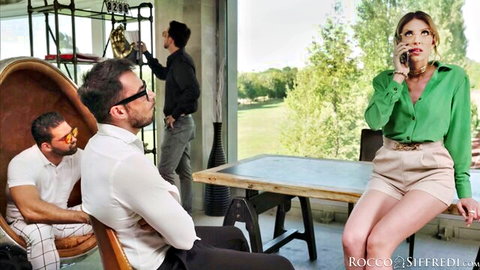 Lorenzo Viota in Rocco Siffredi's Glasses Clanking in Ecstasy, blonde in green blouse and shorts on phone with two men