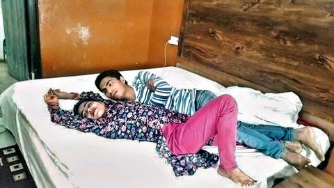 Desi couple cuddling intimately on bed in hot Indian amateur scene
