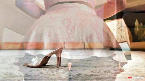 Jenna Starr teasing in pink skirt and high heels from behind
