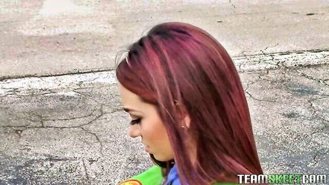Kiley Jay redhead cutie with purple-tinted hair in profile pose