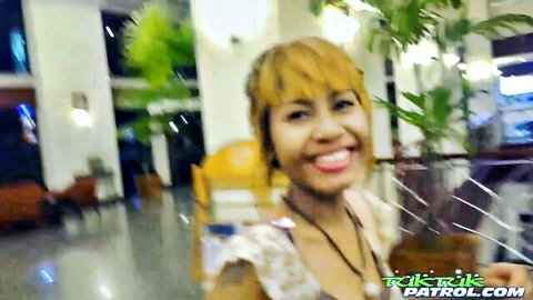 Smiling petite Filipina with blonde hair in hotel, teases before big cock creampie