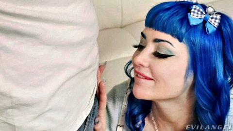 Jewelz Blu with blue hair and bow close to Bryan Gozzling's crotch