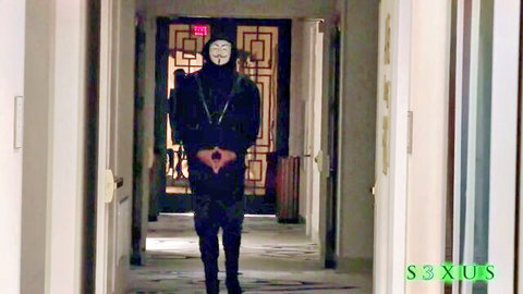 Madison Wilde in mysterious Guy Fawkes mask, black outfit in hallway, Prana Yama adult scene