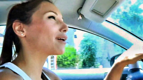 Celeste Star driving car with seductive open mouth smile, teasing vibe