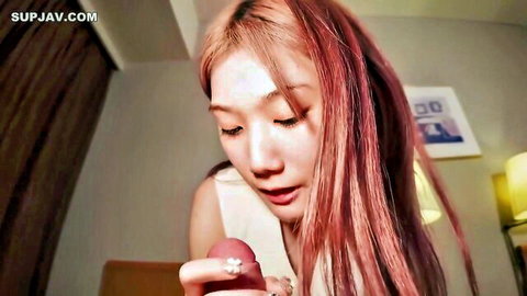 Tall Asian model with long pink hair and delicate figure close-up