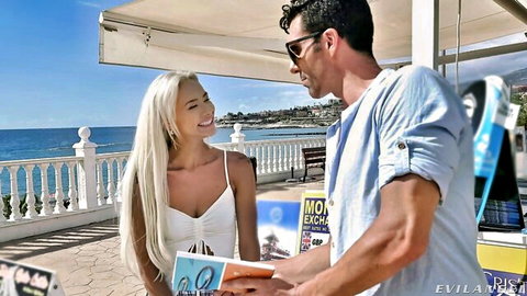 Veronica Leal in white top flirts with hunk at beachside exchange