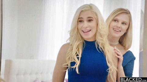 Lily Rader and Joseline Kelly, blonde best friends smiling in blue tops