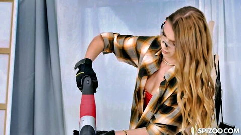 Alexis Crystal blonde in open plaid shirt, red bra, gloves holding red dildo