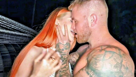 Little Dragon redhead slim babe kissing tattooed muscular stud