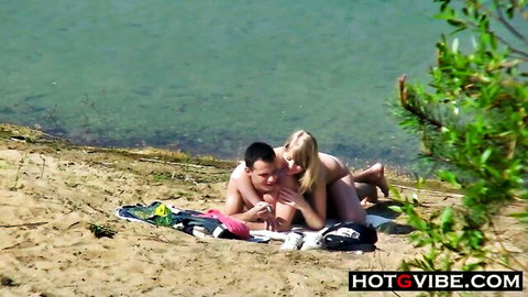 Blonde with massive butt rides cock on sunny beach