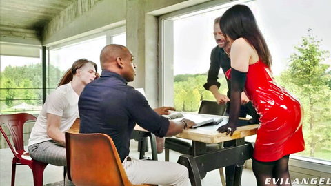 Rocco Siffredi with brunette in red dress & BBC in group scene