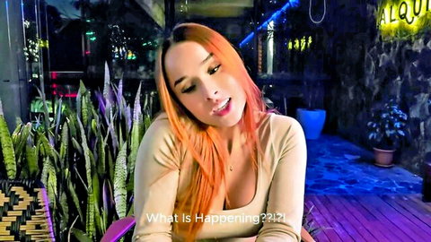 Abella Olsen surprised outdoors, orange-haired beauty in low-cut beige top