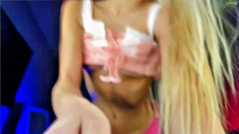 Blonde Enchant Baby in revealing pink top, slim midriff tease