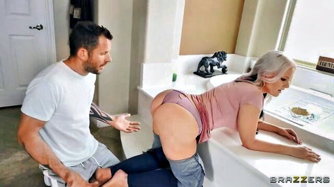 Curvy white-haired MILF bent over bathroom sink with huge ass exposed as tattooed stud grips her for doggy style pounding
