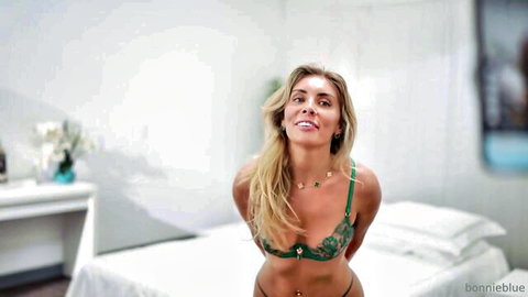 Bonnie Blue in revealing green lingerie, blonde posing seductively