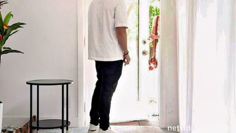 Tess in casual white tee and jeans at NetVideoGirls doorway audition