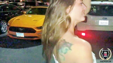 Febby Twigs smiles seductively in white dress beside yellow Mustang at night, Rome Major