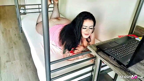 Curvy brunette BBW with big ass in fishnets and pink top teases on bunk bed while eyeing laptop