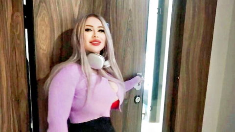 Blonde babe with huge tits spilling from red bra in open purple sweater teases at door