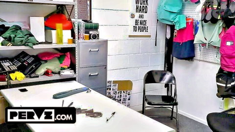 Empty employee locker room with hanging clothes and motivational posters before steamy action