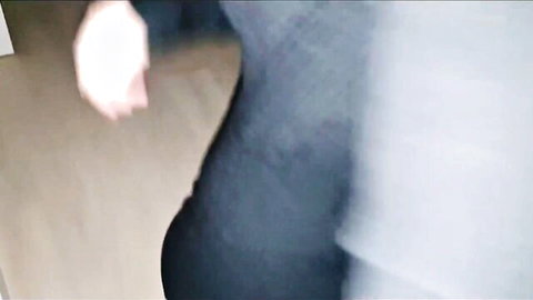 Blurry side view of Tinder girl in gray sweater, intimate hookup tease