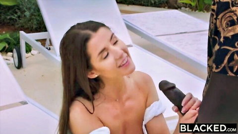 Sybil Kailena topless smiling with big black dildo by pool, Blacked