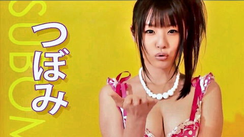 Japanese amateur in pink frilly dress with deep cleavage, black ponytail, playful finger pose