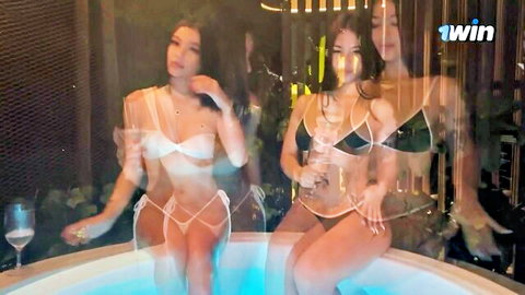 Anna Cherry7 and Asian friend in skimpy bikinis in hot tub threesome tease