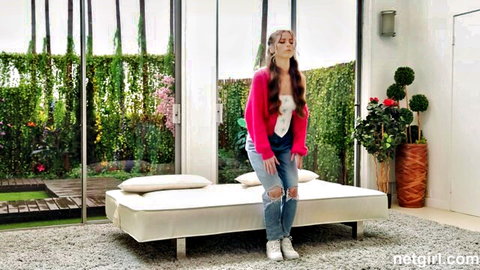 Renee Rose standing in pink cardigan, ripped jeans in NetGirl 4K