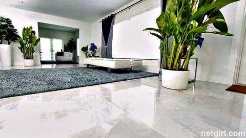 Bunny Returns in luxurious white room - Netgirl adult video setup