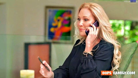 Blonde MILF Alexis Malone on phone in sexy black top