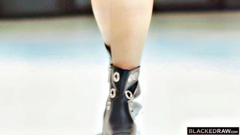 Chloe Temple tiny blonde in sexy black buckled boots closeup