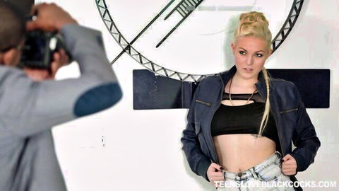 Jenna Ivory blonde model posing sexy in leather jacket during photoshoot