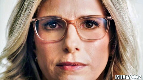 Cory Chase blonde MILF in glasses close-up portrait