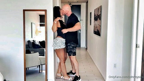 Nadine Kerastas kissing Johnny Sins passionately in hallway