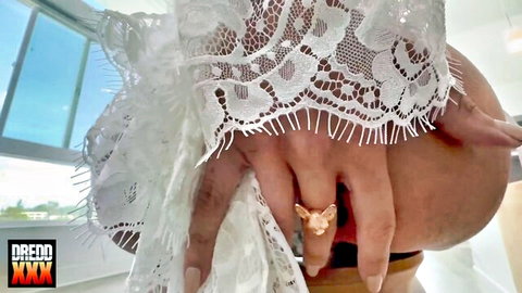 Little Dragon in seductive white lace lingerie, teasing close-up view